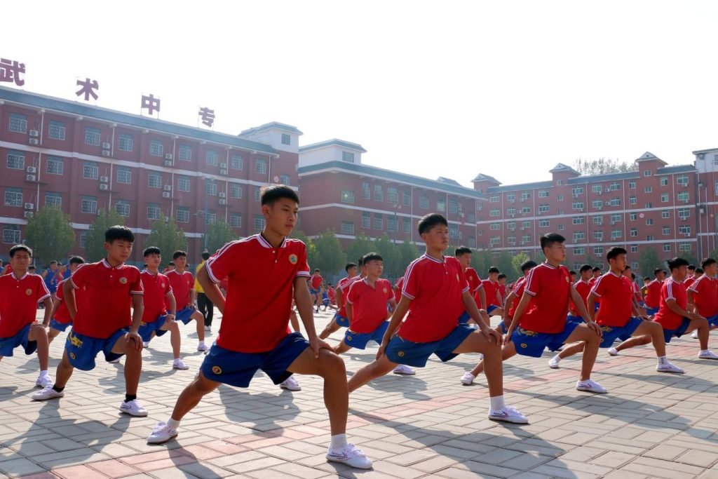 image shows students doing shaolin kung fu at shaolin kung fu wushu academy