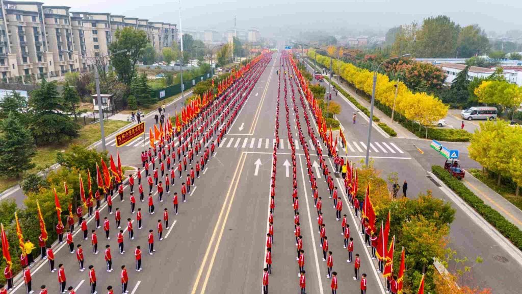 students assembling on the road inside Shaolin Xiaolong Kung Fu School