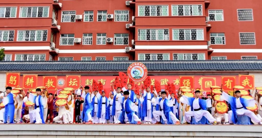 students performing on stage a kung fu and television training