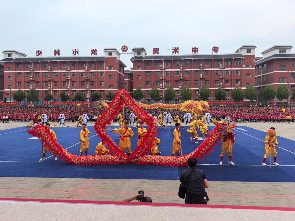image shows disciples performing kung fu dance