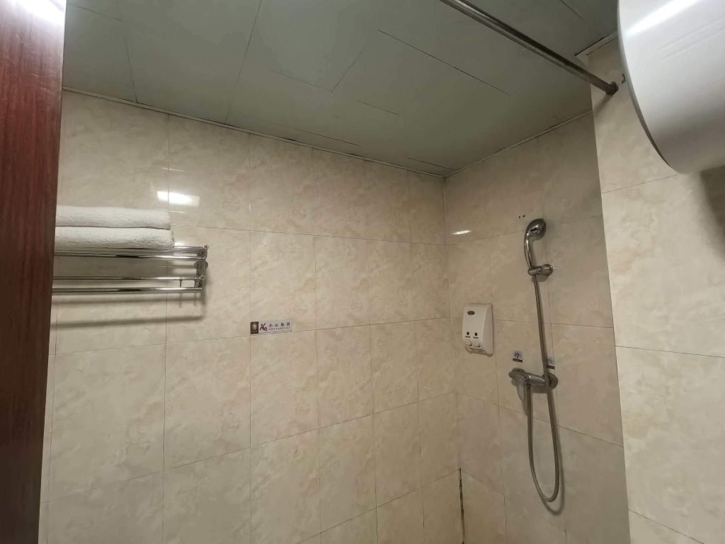 image shows showering area in the bathroom in Shaolin Kung Fu School Accommodation